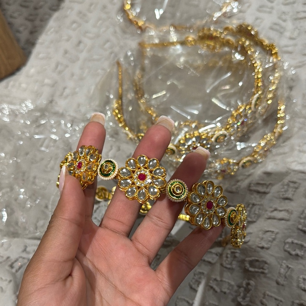 Traditional Gold-Tone Floral Kundan headband with Red & Green Accents